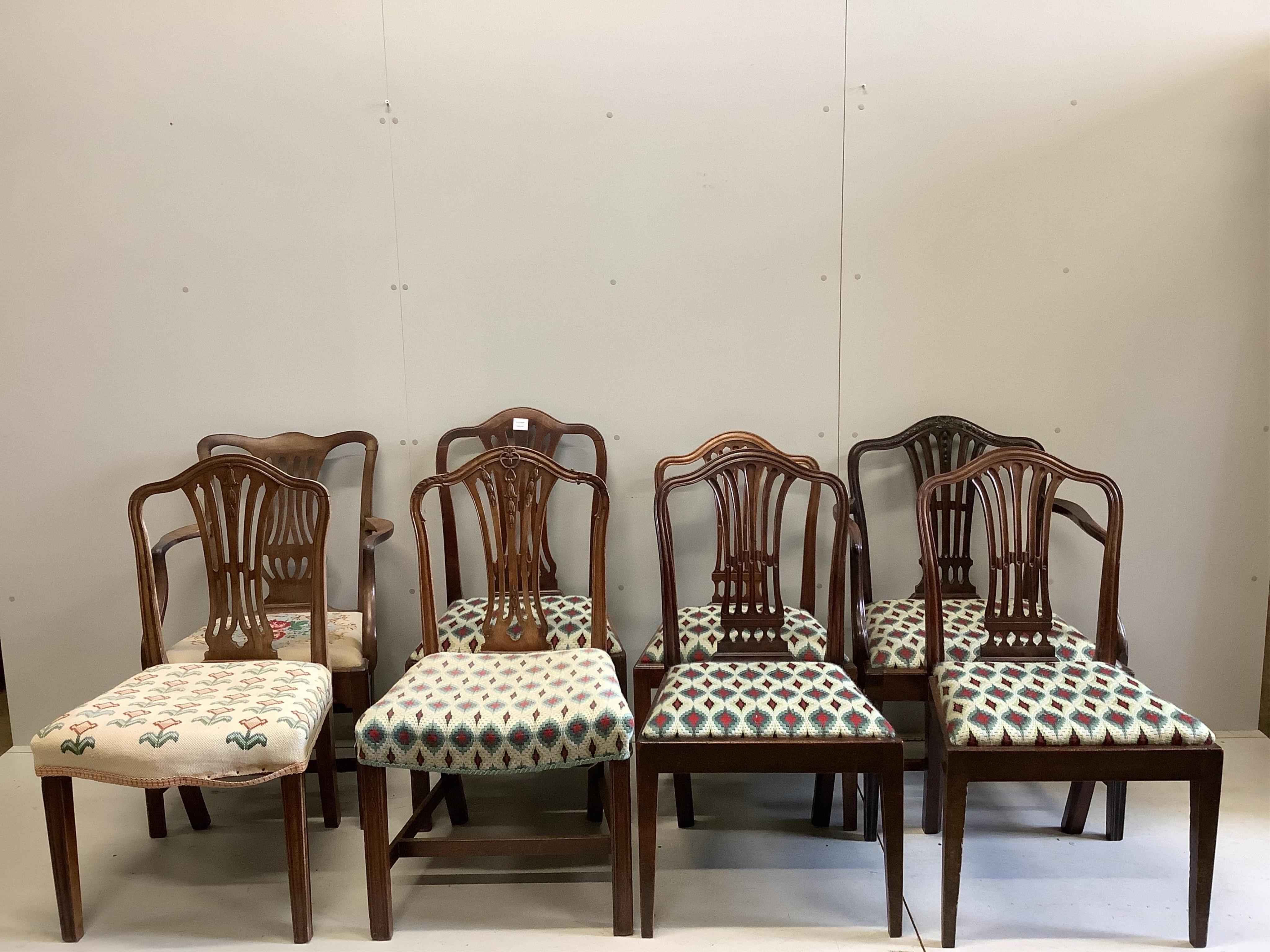 A harlequin set of eight George III style mahogany dining chairs, one with arms. Condition - fair